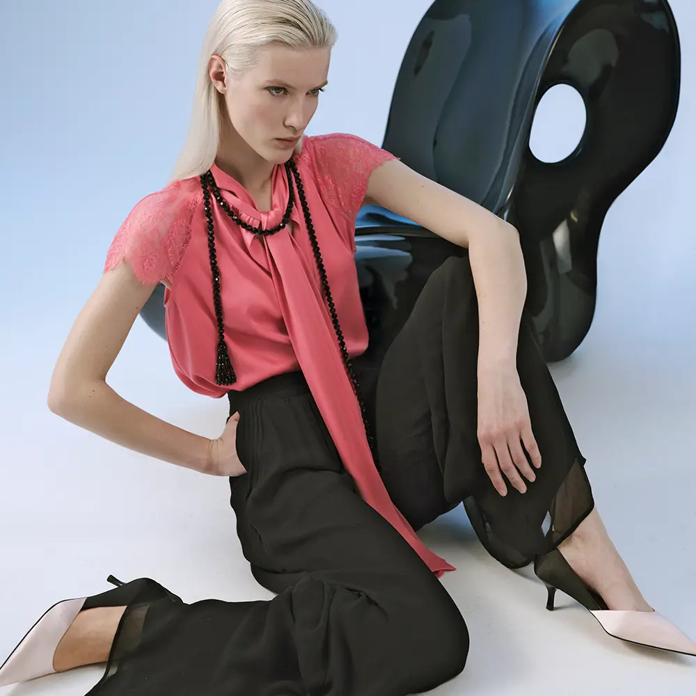Lace blouse and silk pants with pumps and accessories