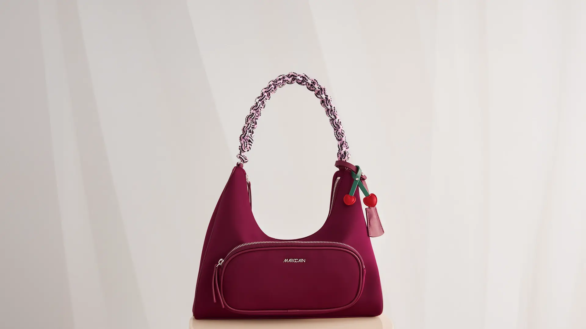 Neoprene shoulder bag with zips and braided handle