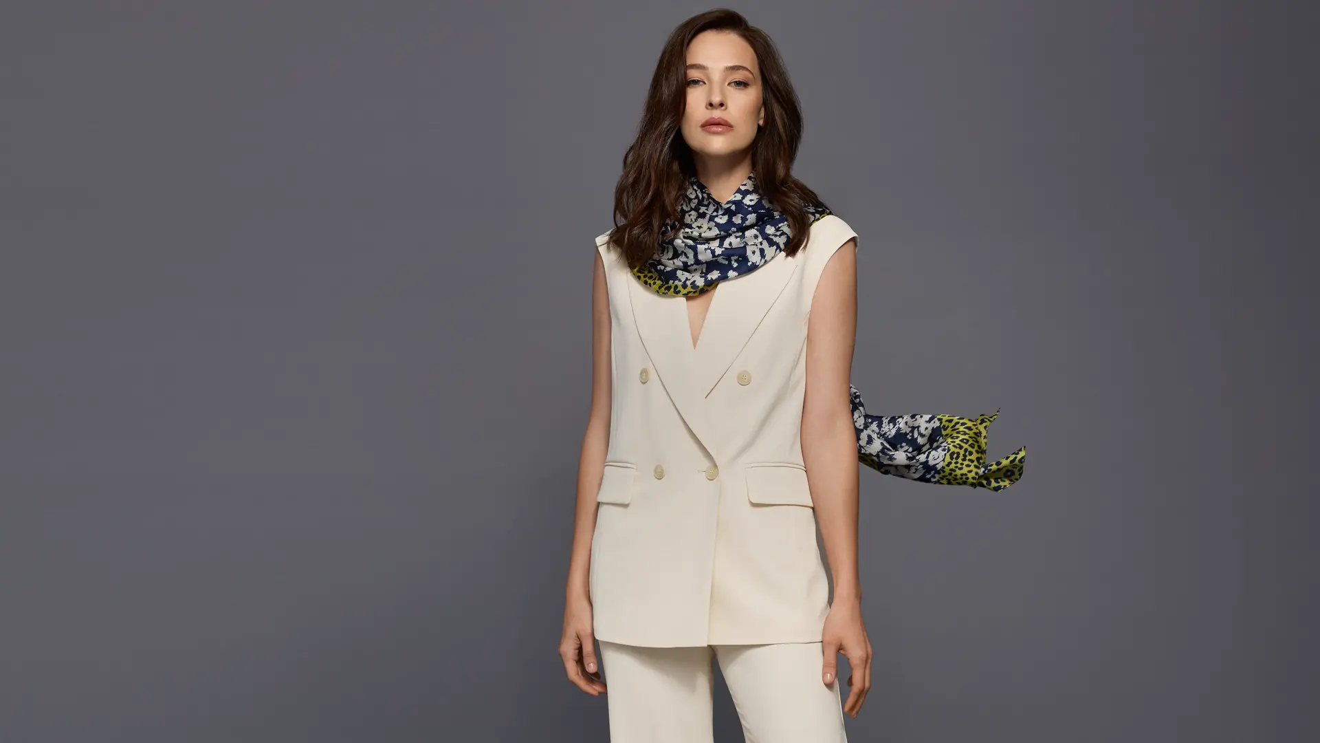 Sleeveless blazer waistcoat with matching trousers in bright ecru