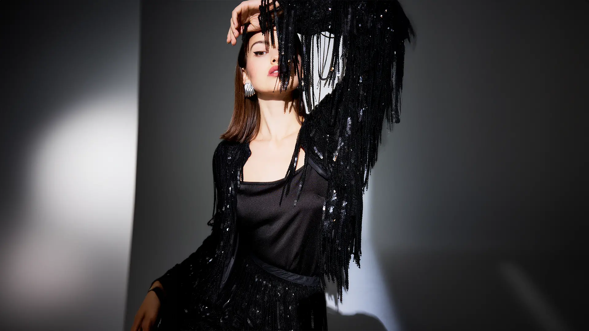 Top festif noir avec ornements