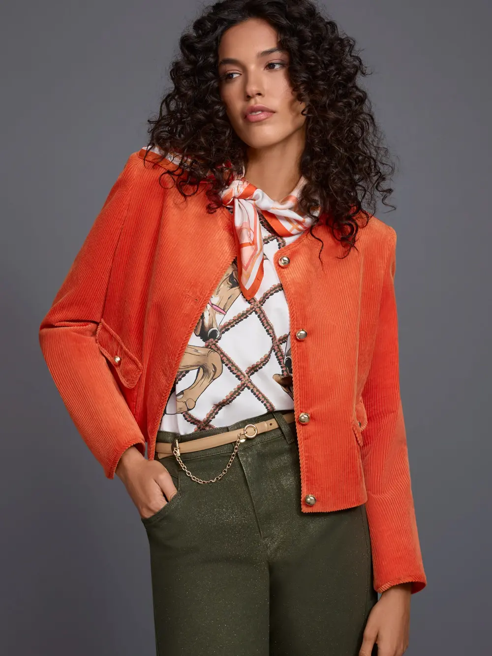 Short jacket with decorative buttons