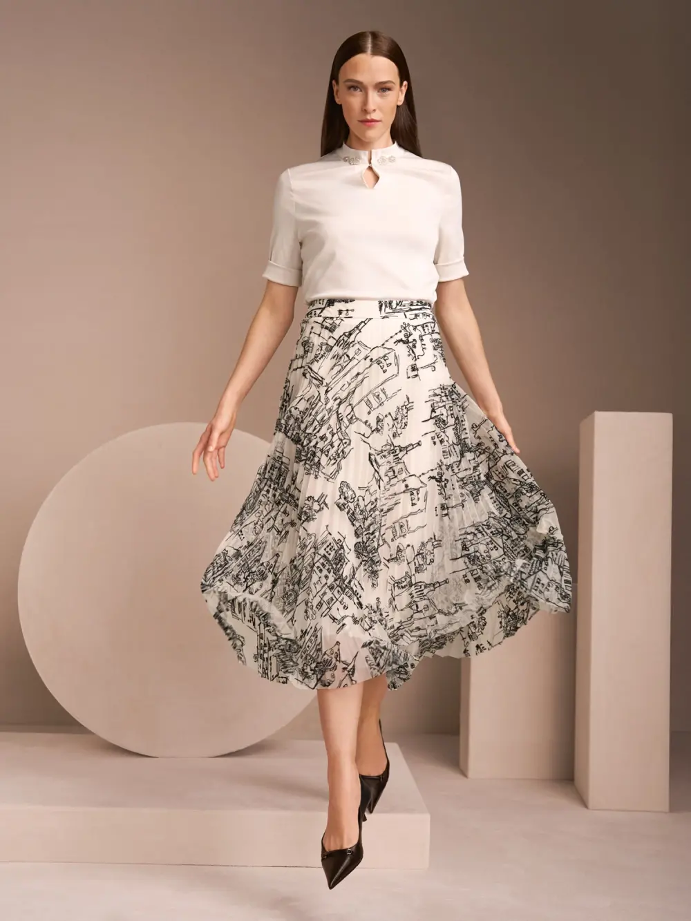 Pleated skirt with City motif