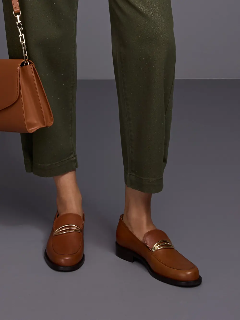 Leather loafers with metal buckle