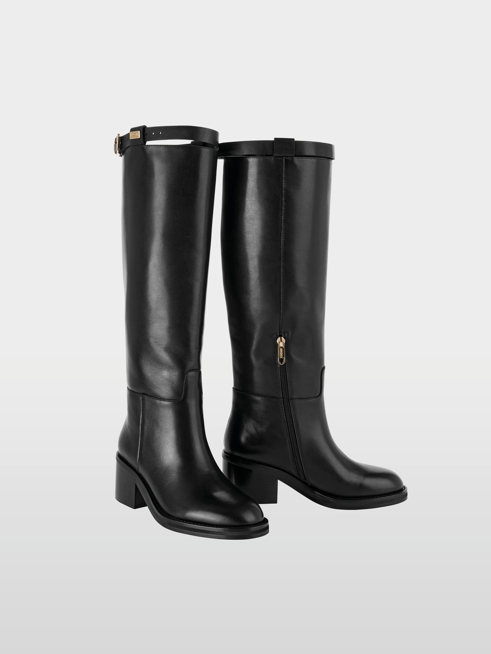 Bottes en cuir avec bride décorative