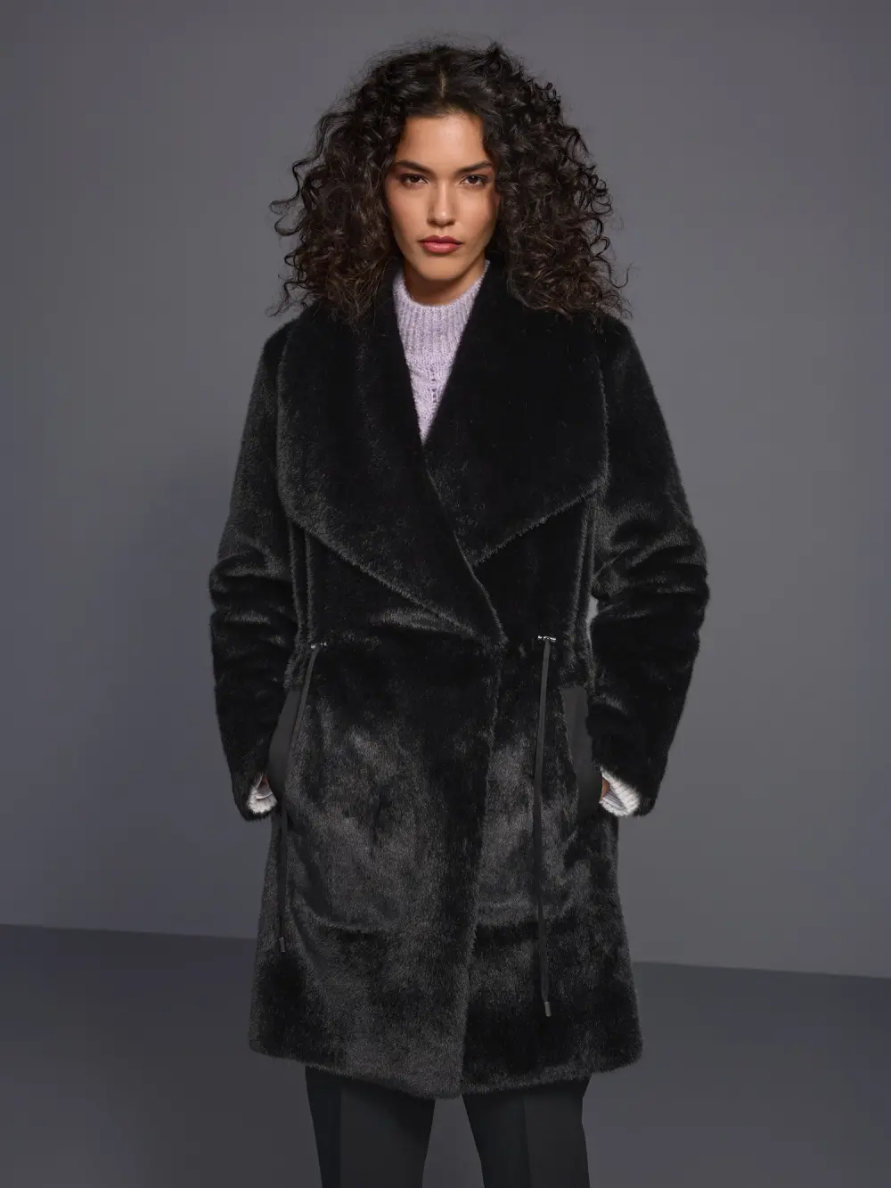 Manteau luxueux en fausse fourrure