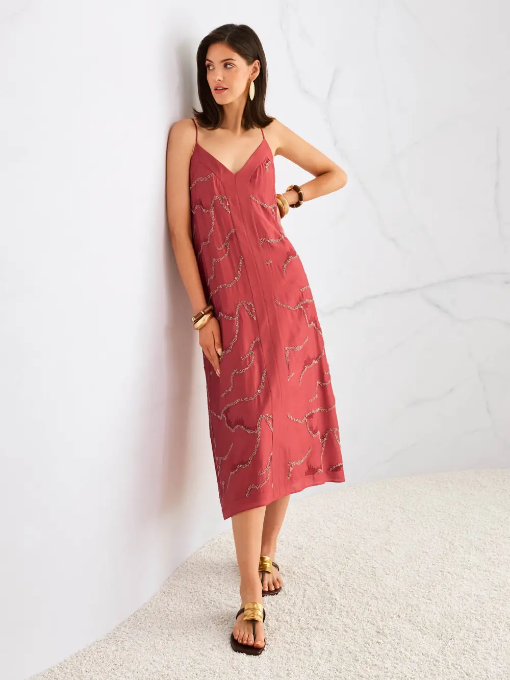 Mid-length dress featuring pearls