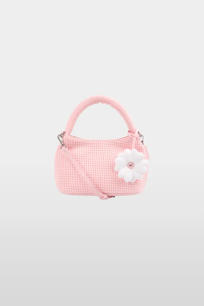 Handbag with knitted surface
