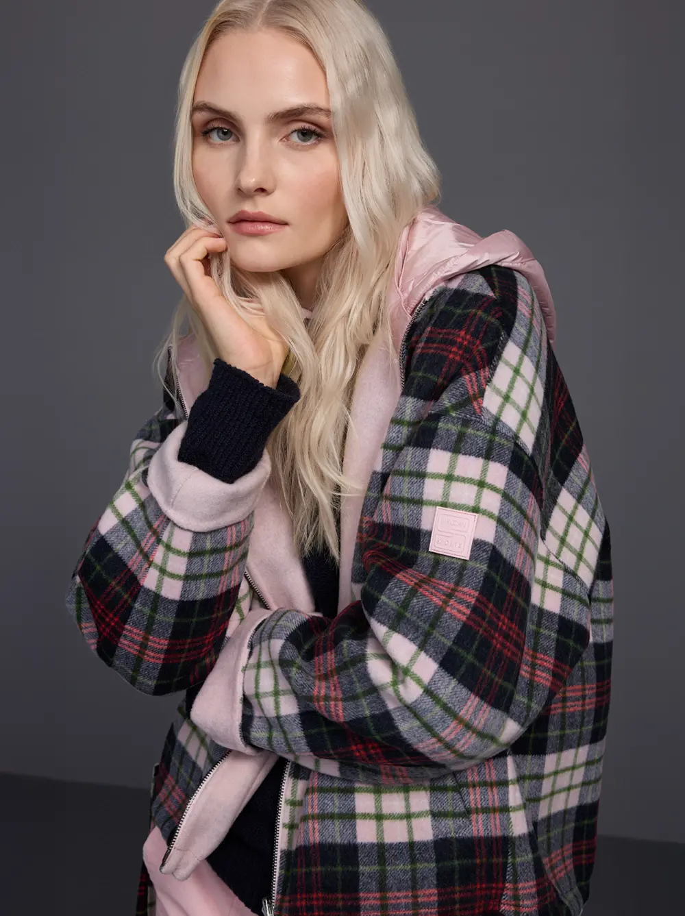 Reversible jacket with quilted hood