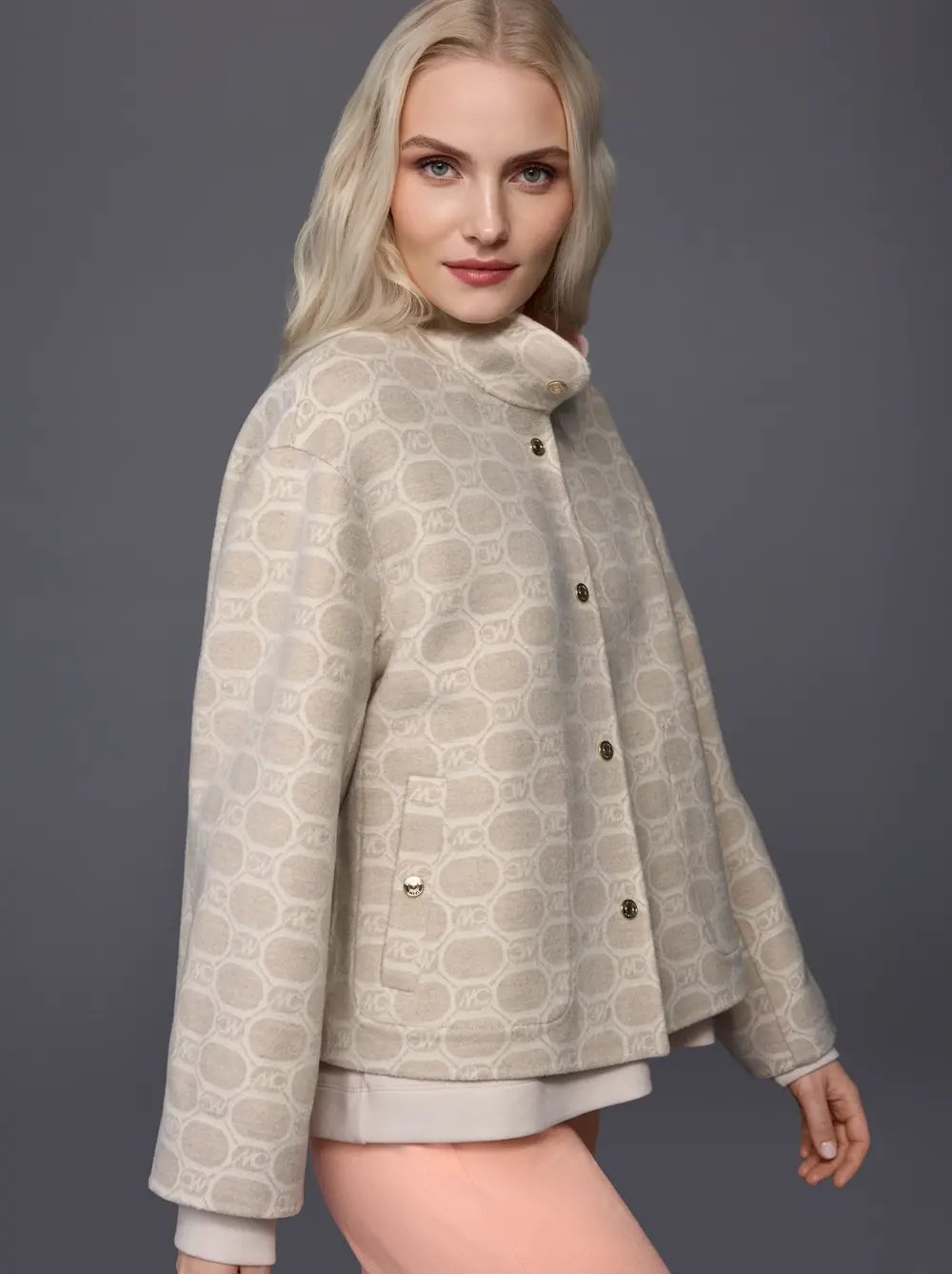 Reversible jacket with quilted hood