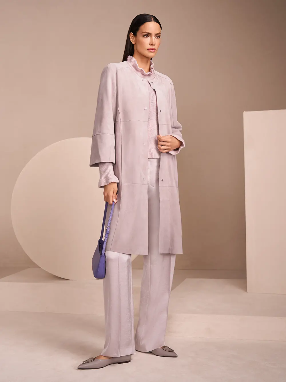 Mantel, Sweater und Hose