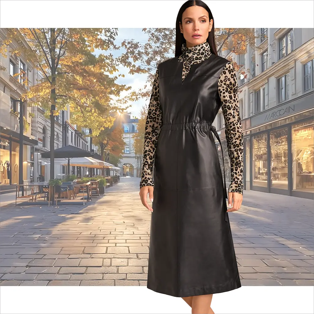 Schwarzes, ärmelloses Lederkleid mit dünnen Longsleeve im Animalprint