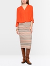 Flowing blouse with decorative button