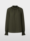 Loose-fitting blouse with smocking