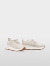 Baskets en tricot avec empiècements en cuir