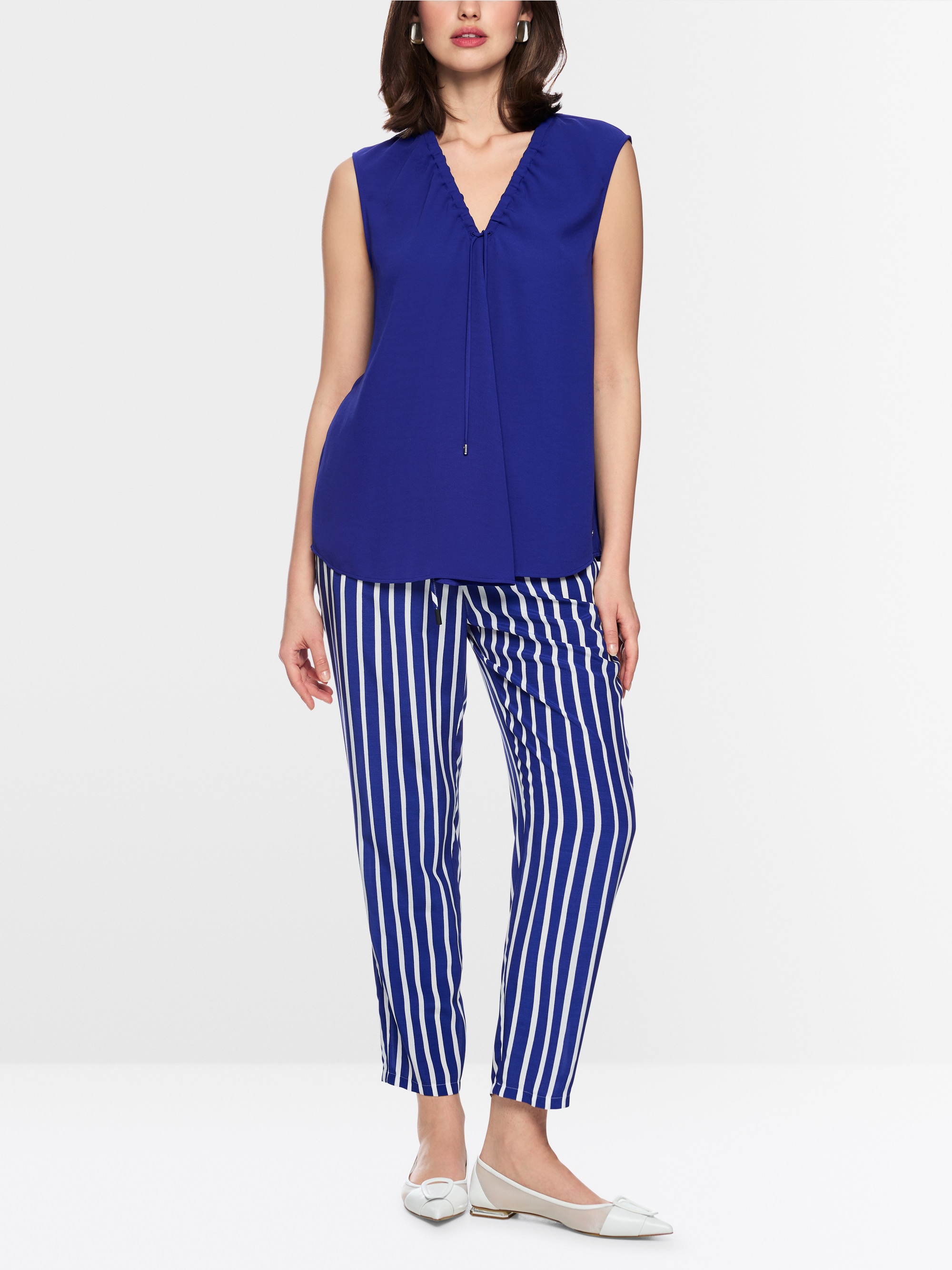 Vibrant top with pleating