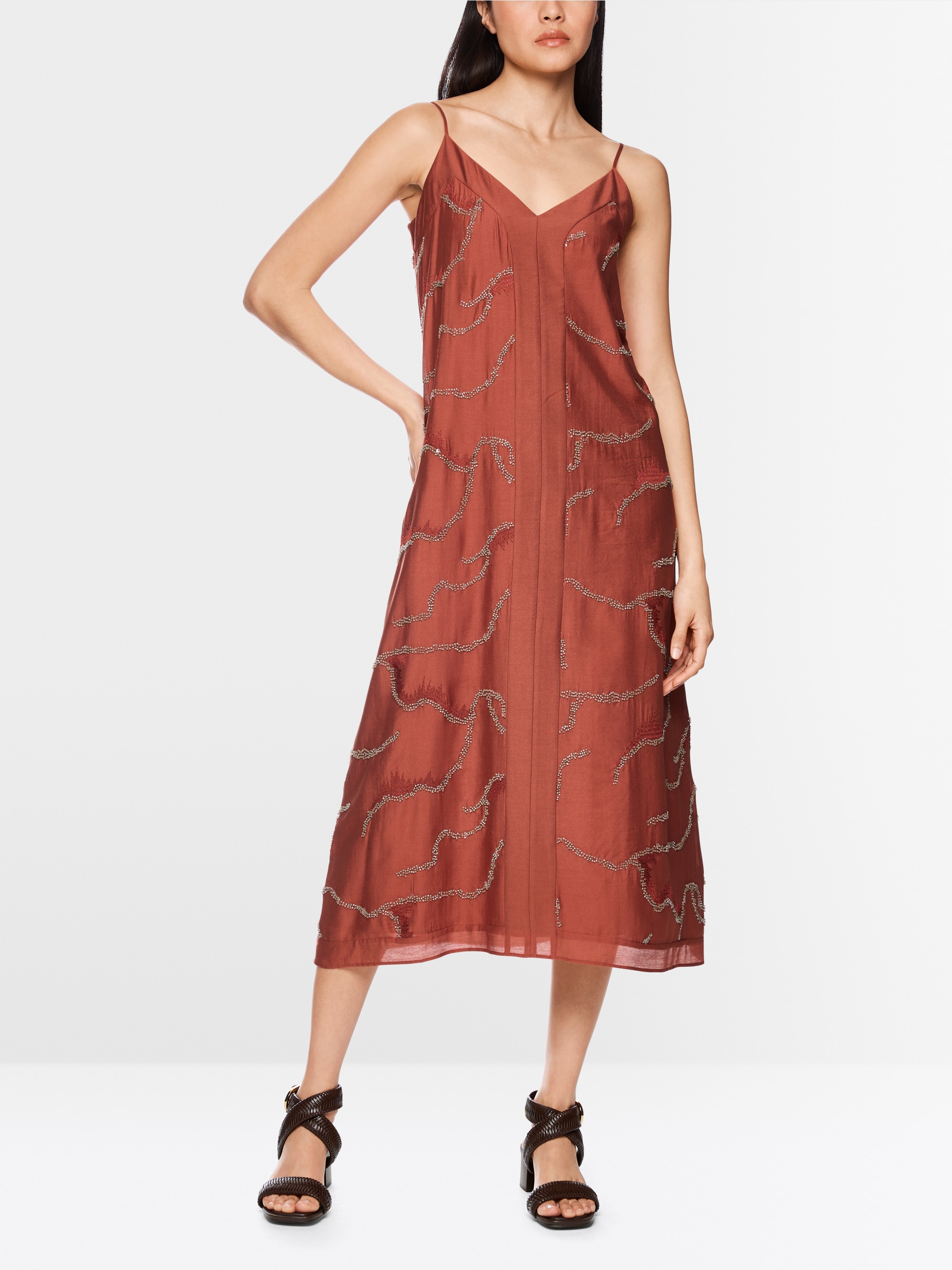 Mid-length dress featuring pearls