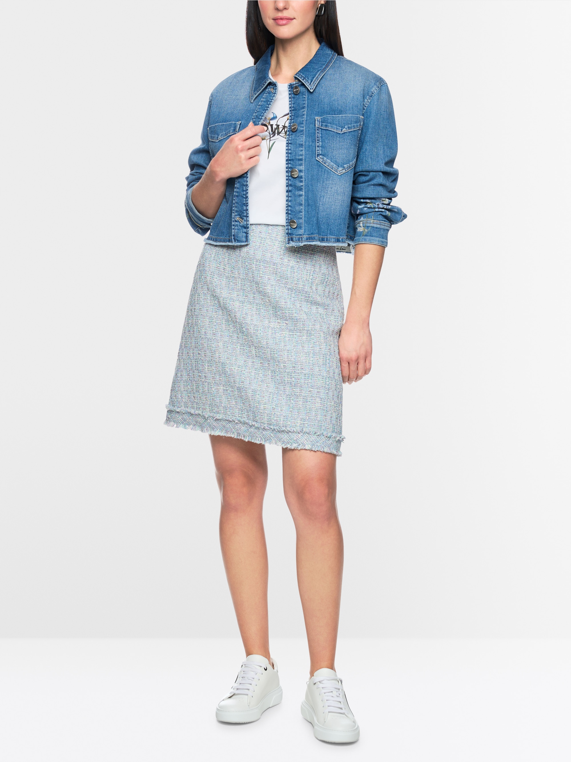 Mini-jupe en bouclé à franges