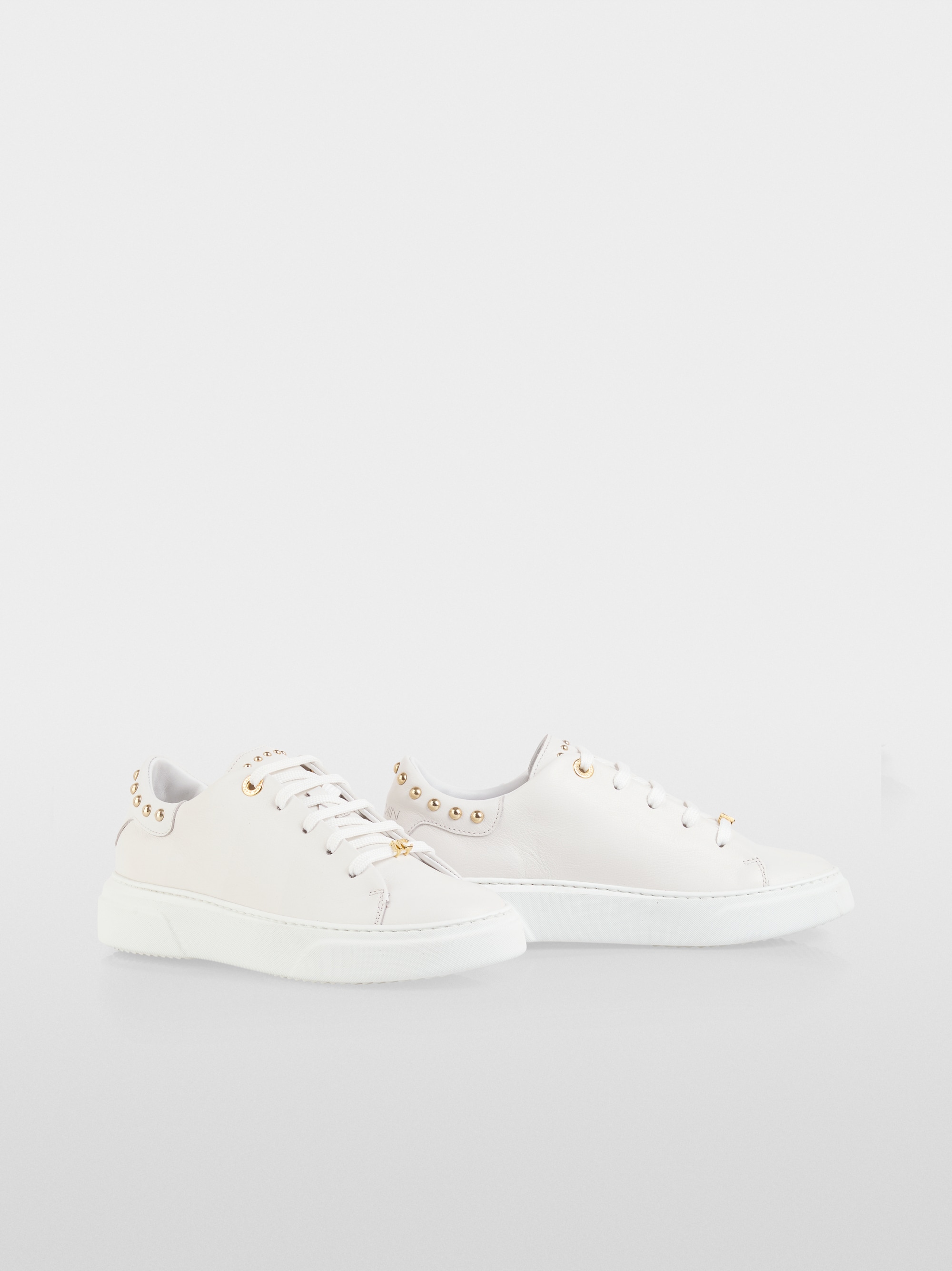 Leather trainers with stud details