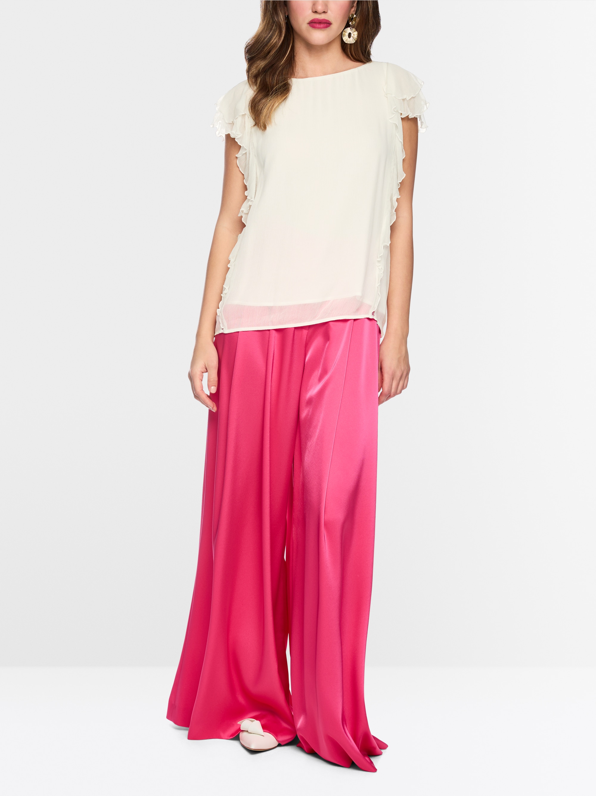 Delicate blouse with ruffles