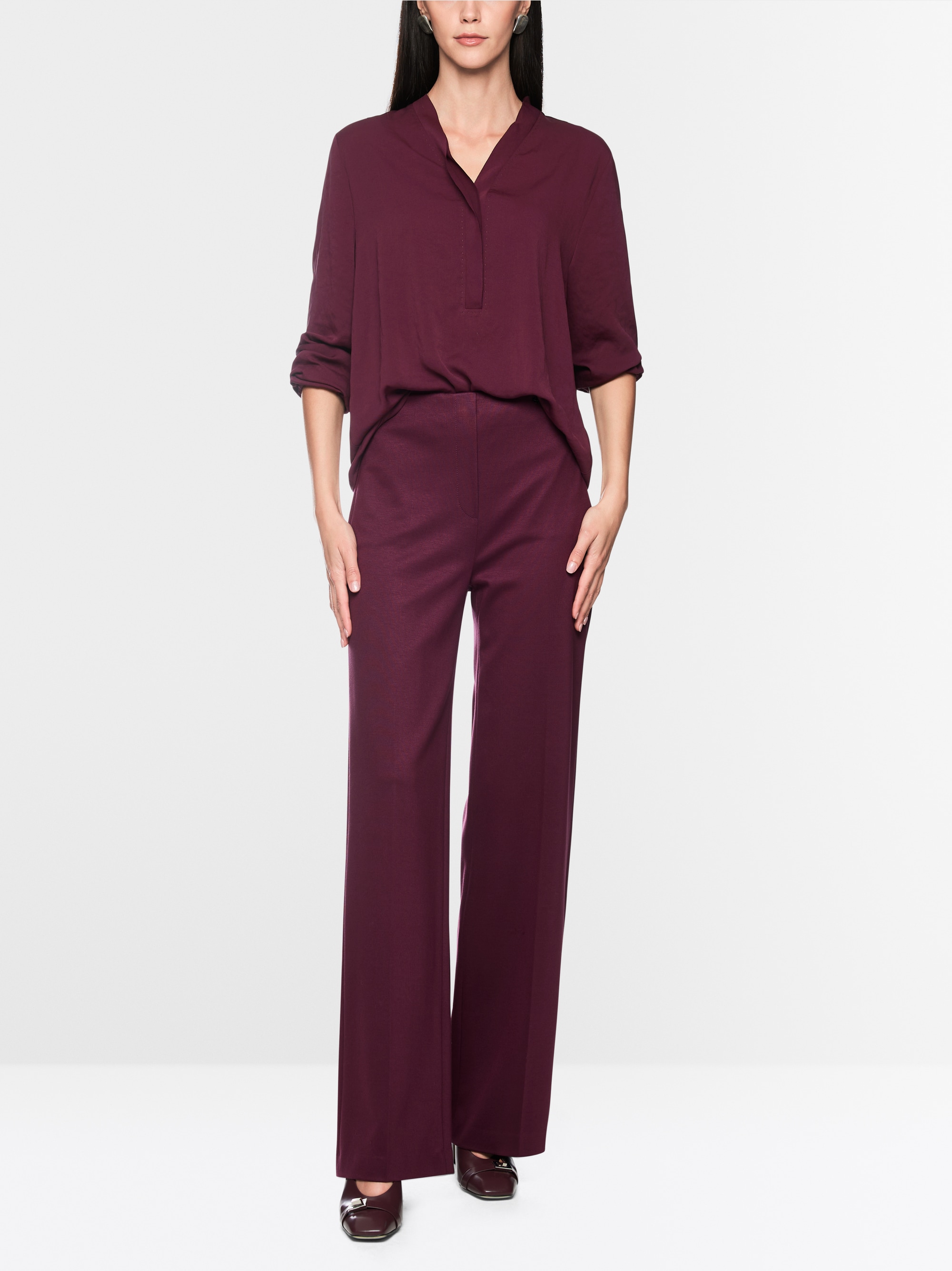 Loose-fitting blouse with V-neck