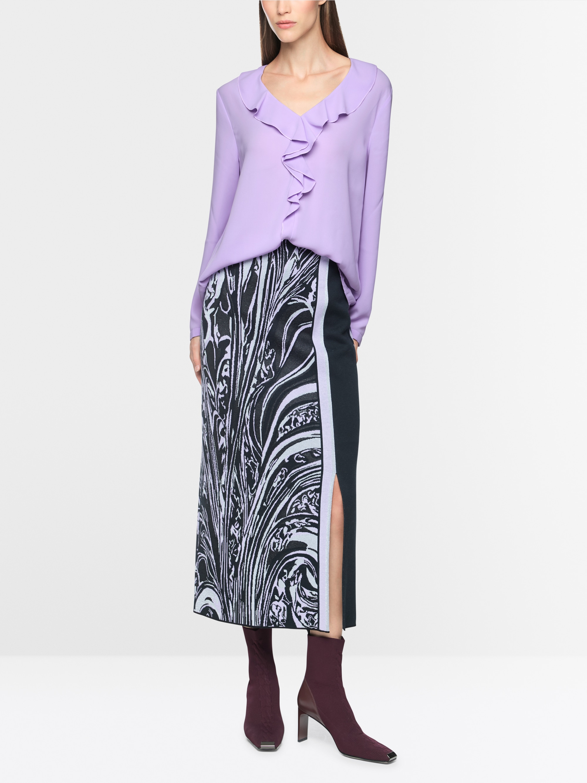Blouse with flounces