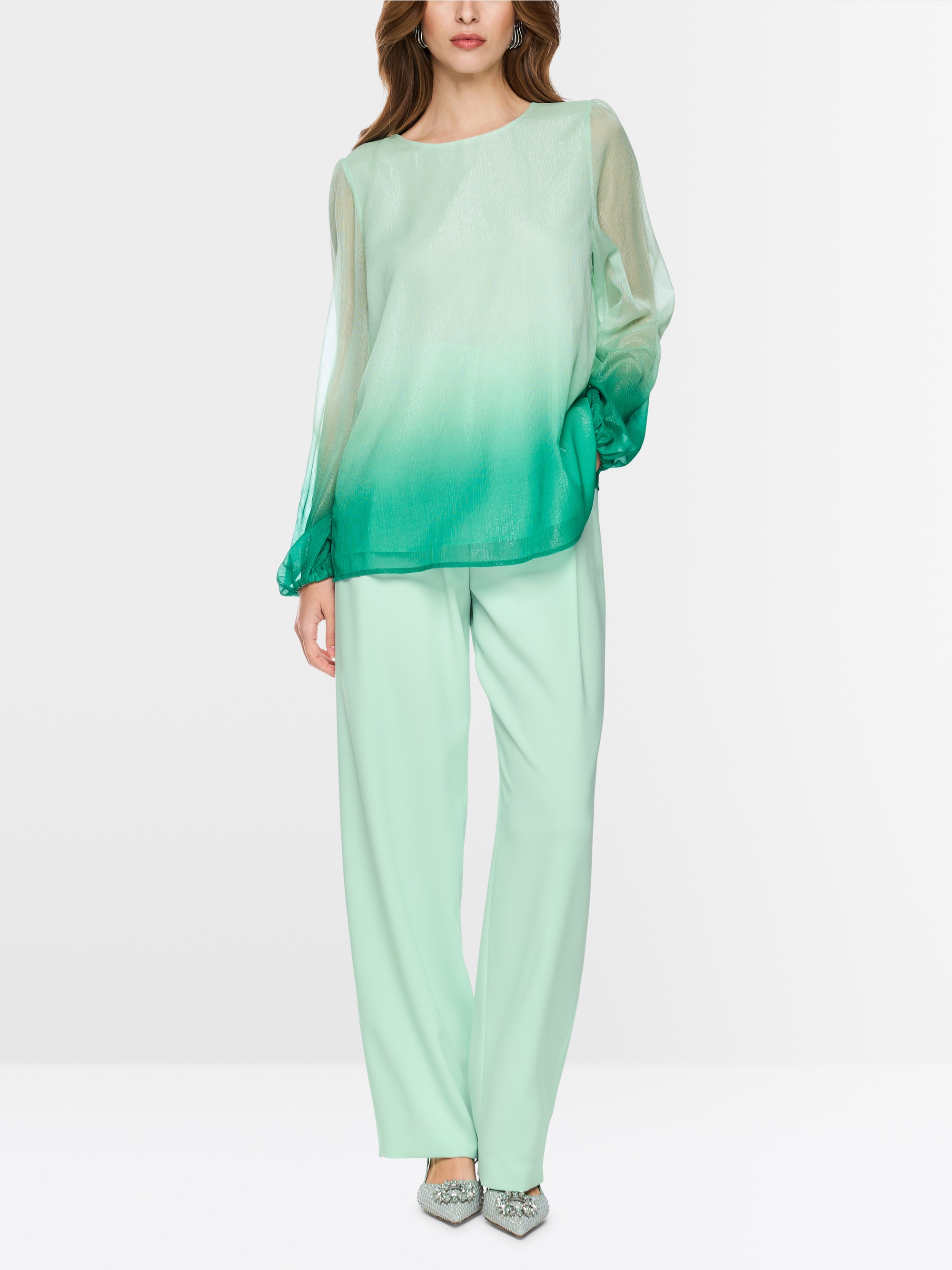 Tunic blouse with elasticated cuffs