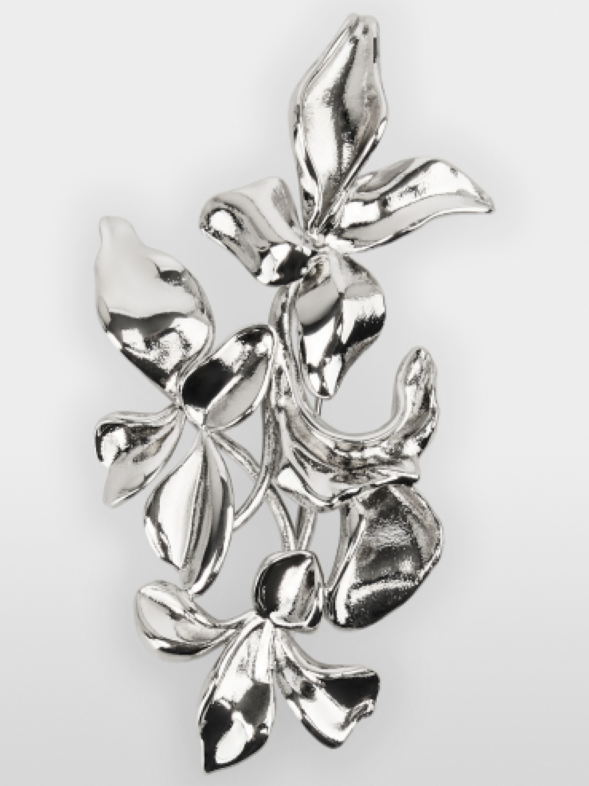 Silver-coloured flower brooch