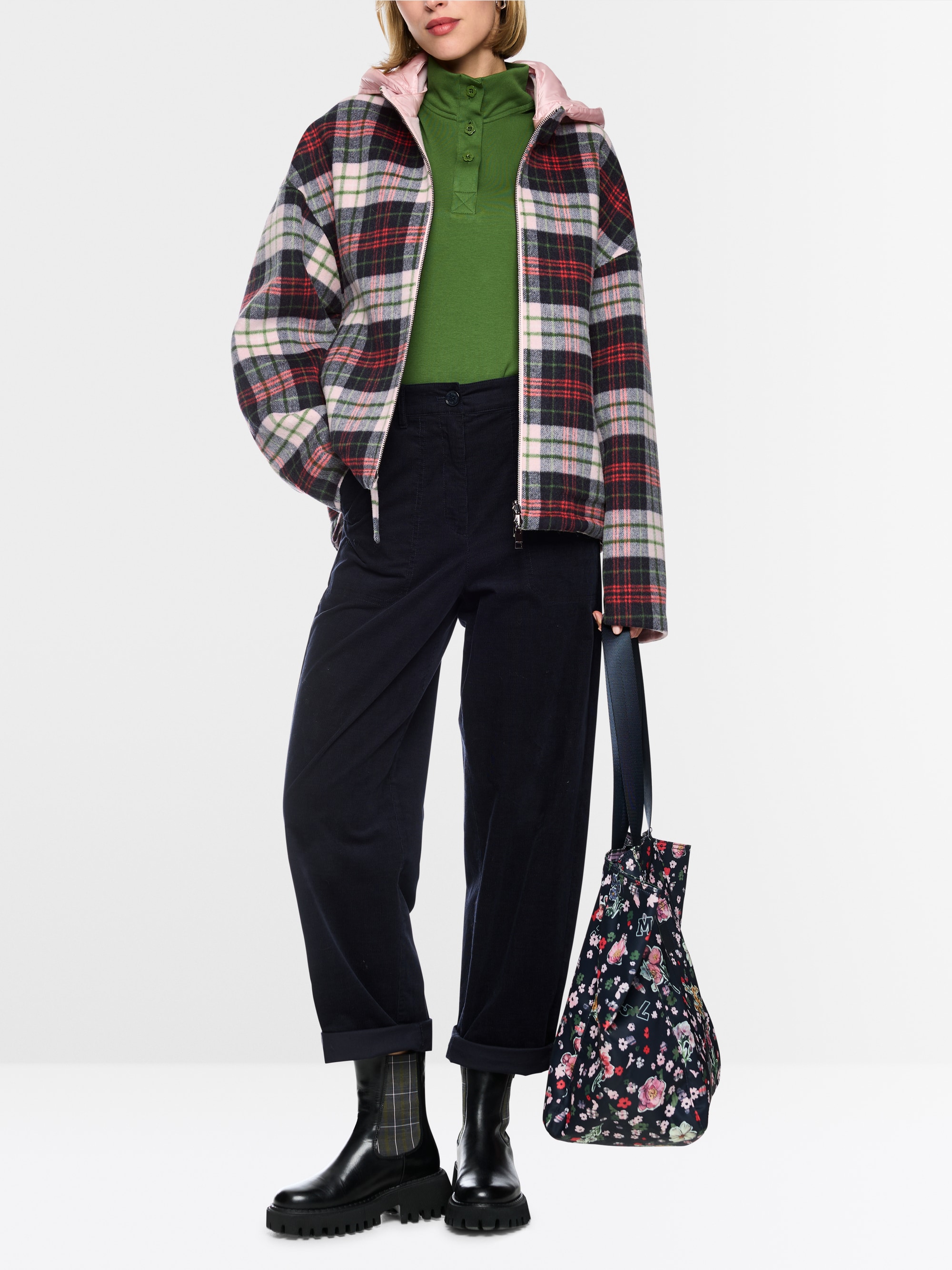 Reversible jacket with quilted hood