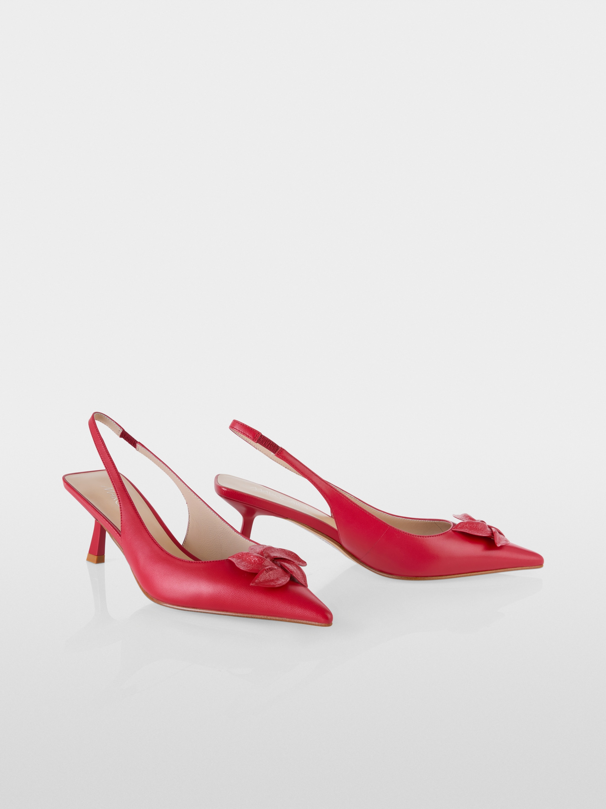 Slingback pumps in calf leather