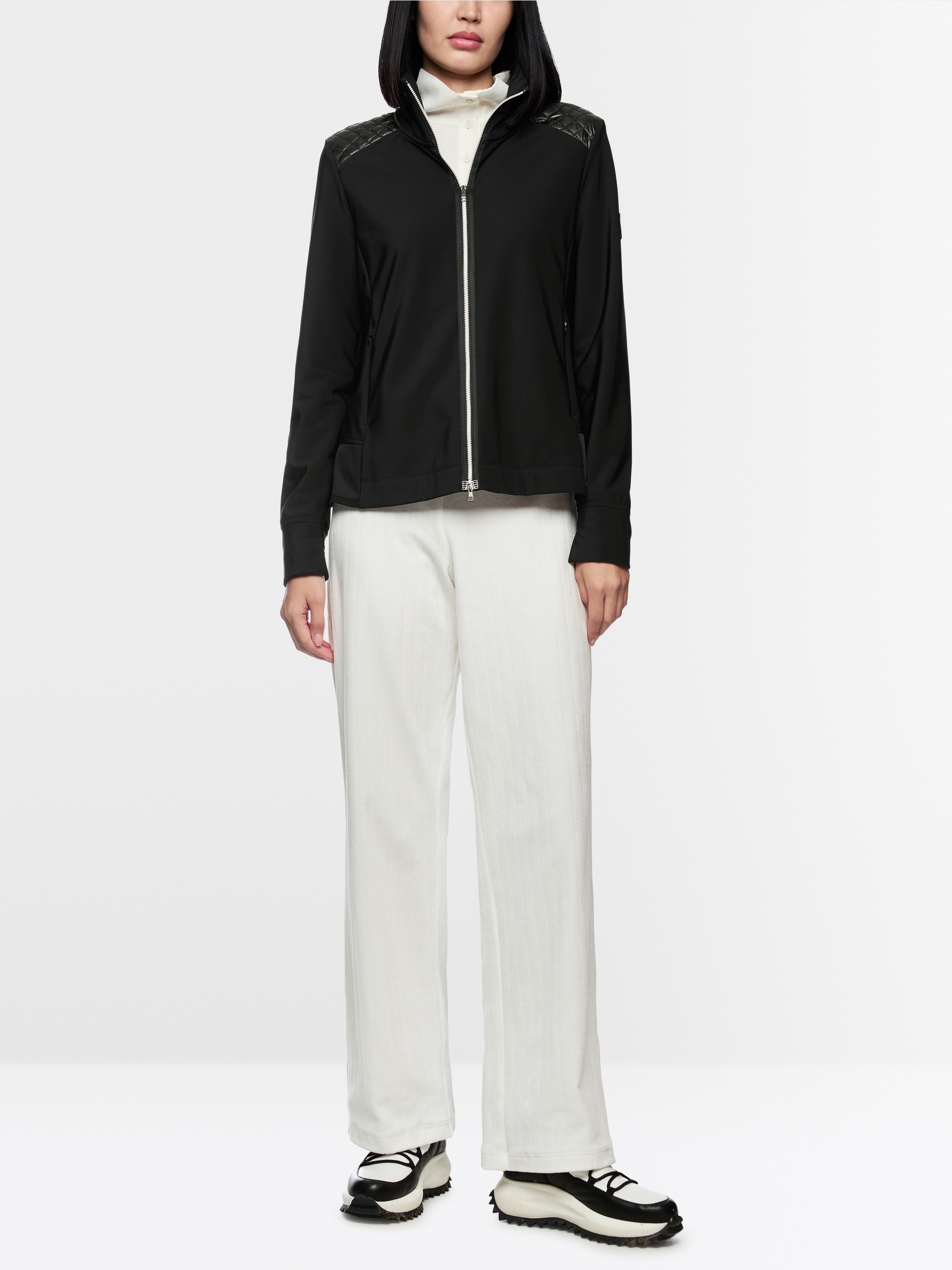 Fitted jacket with patent details