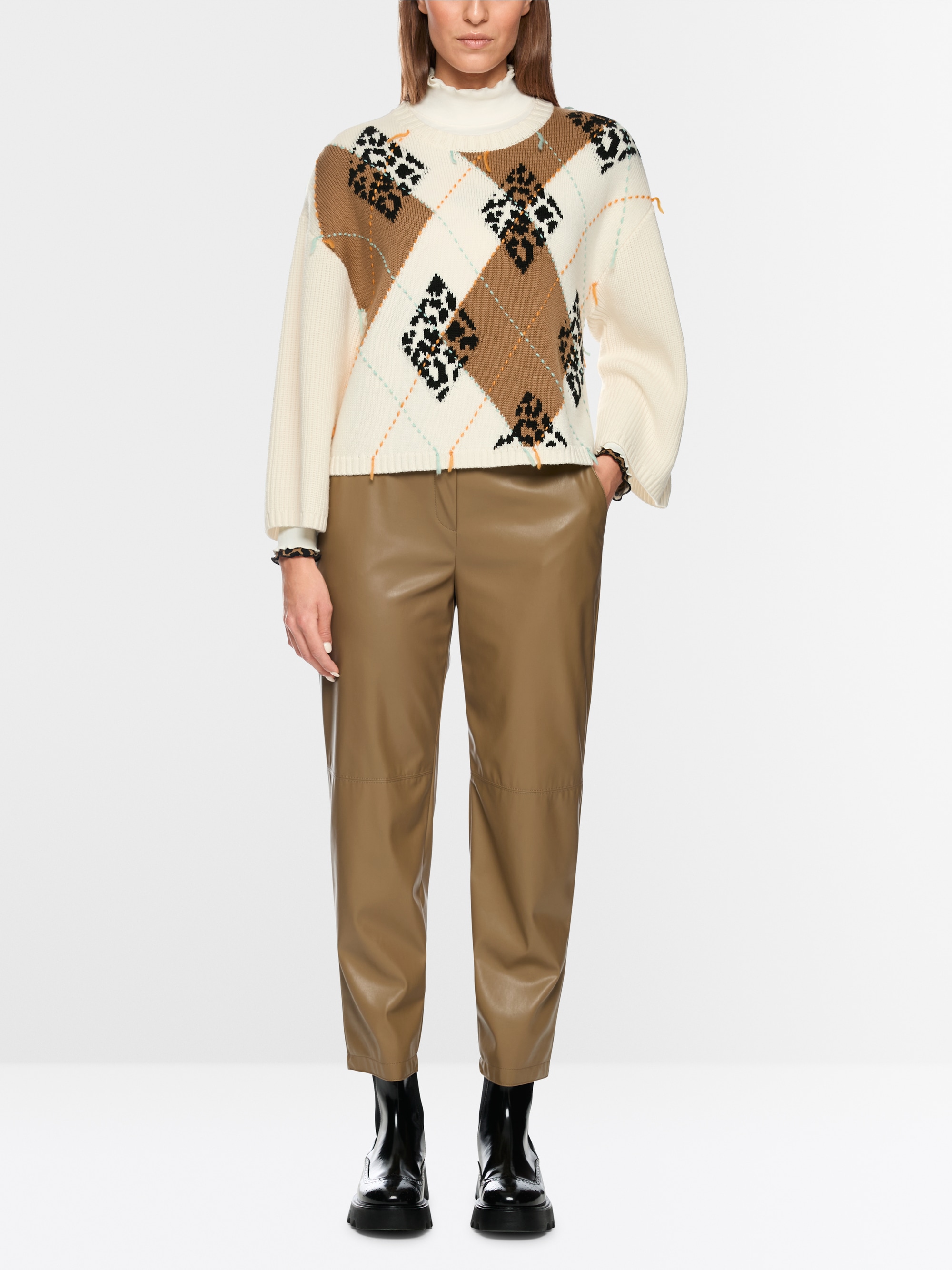 Wool jumper with argyle and fringes