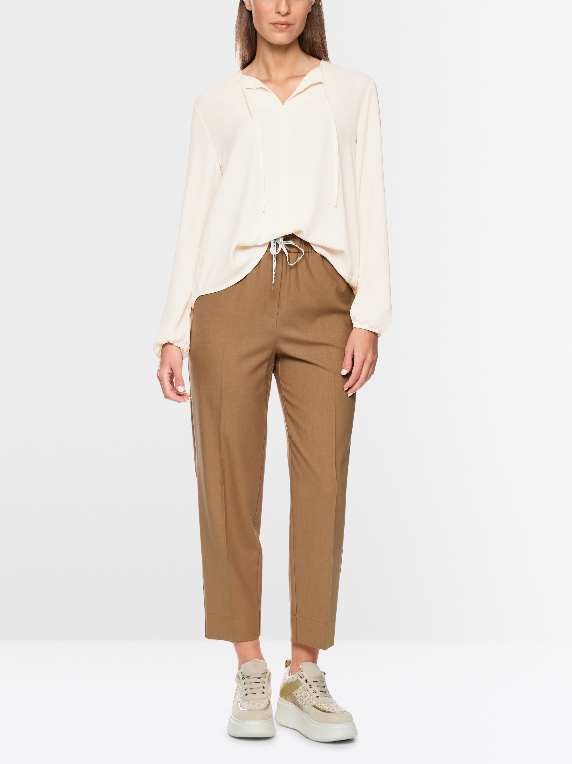 Flowing slip-on blouse with bow