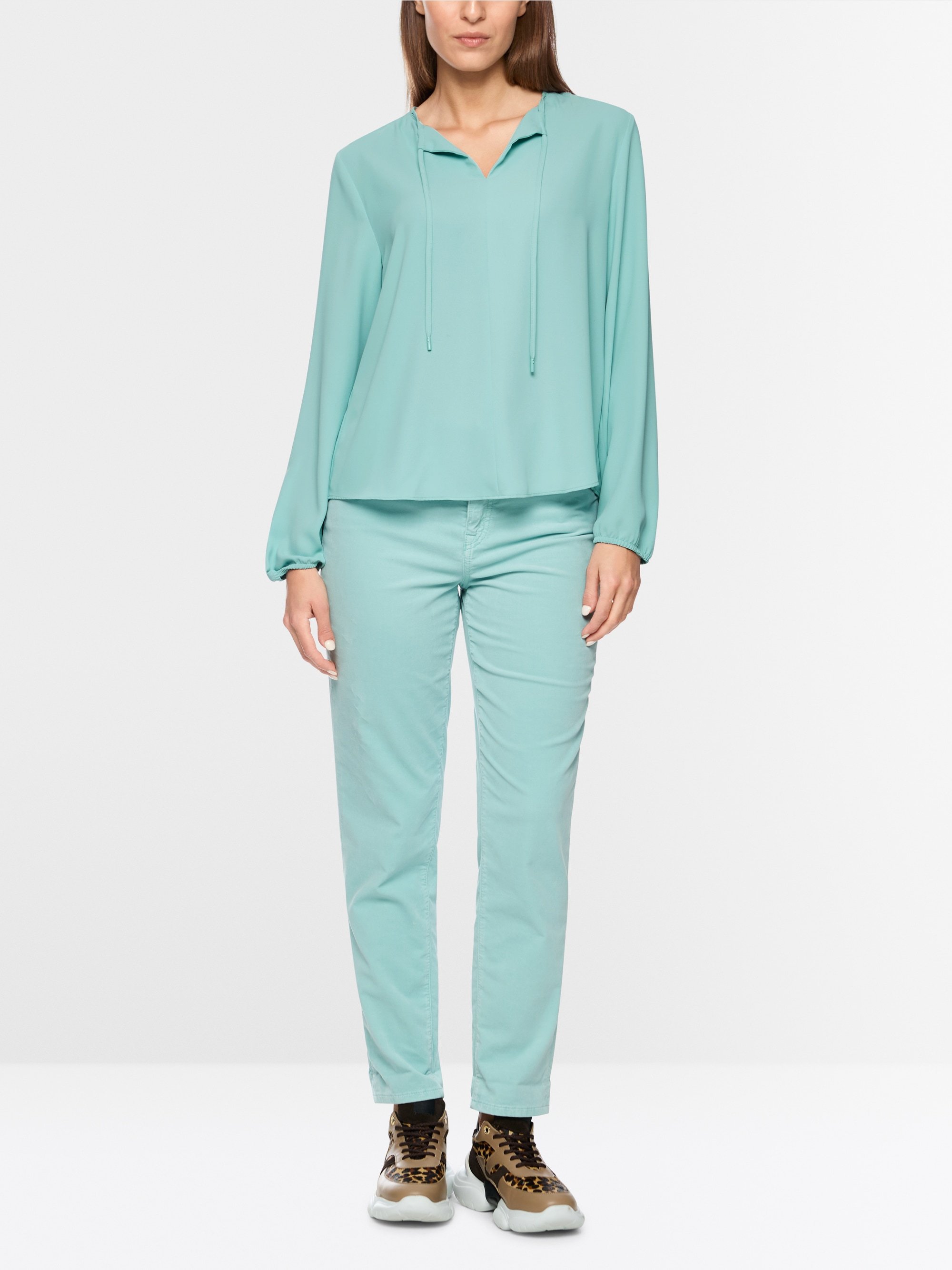 Flowing slip-on blouse with bow