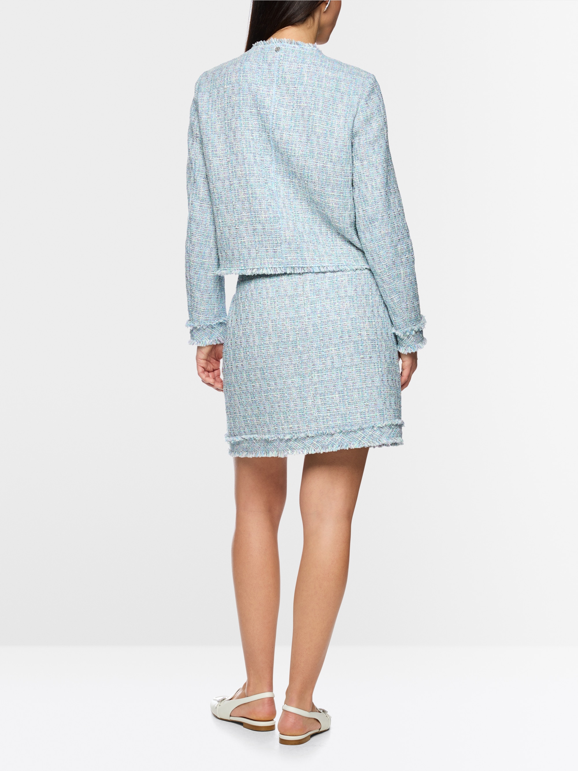 Veste bouclée à franges