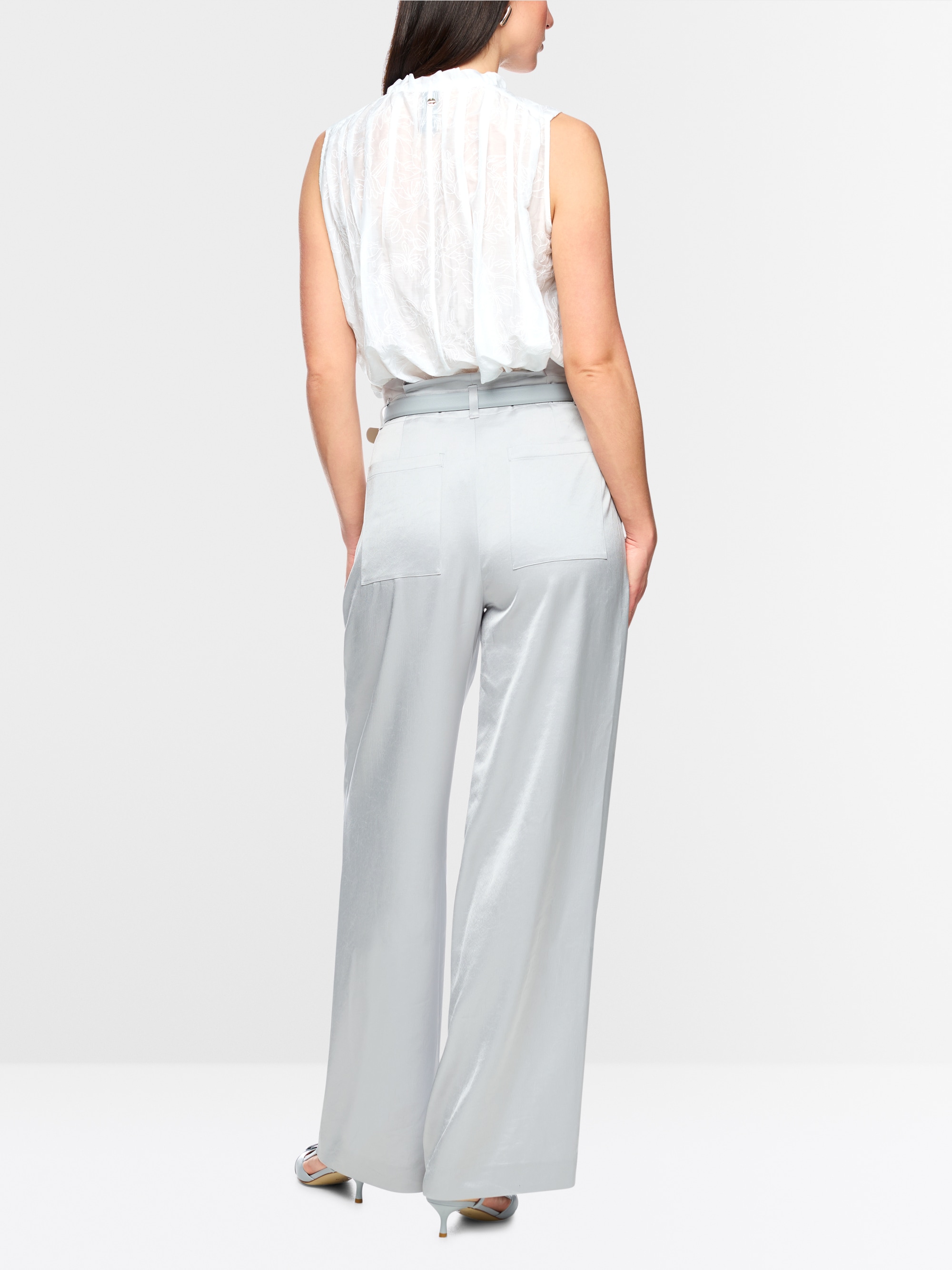 Top with ruffles & floral embroidery