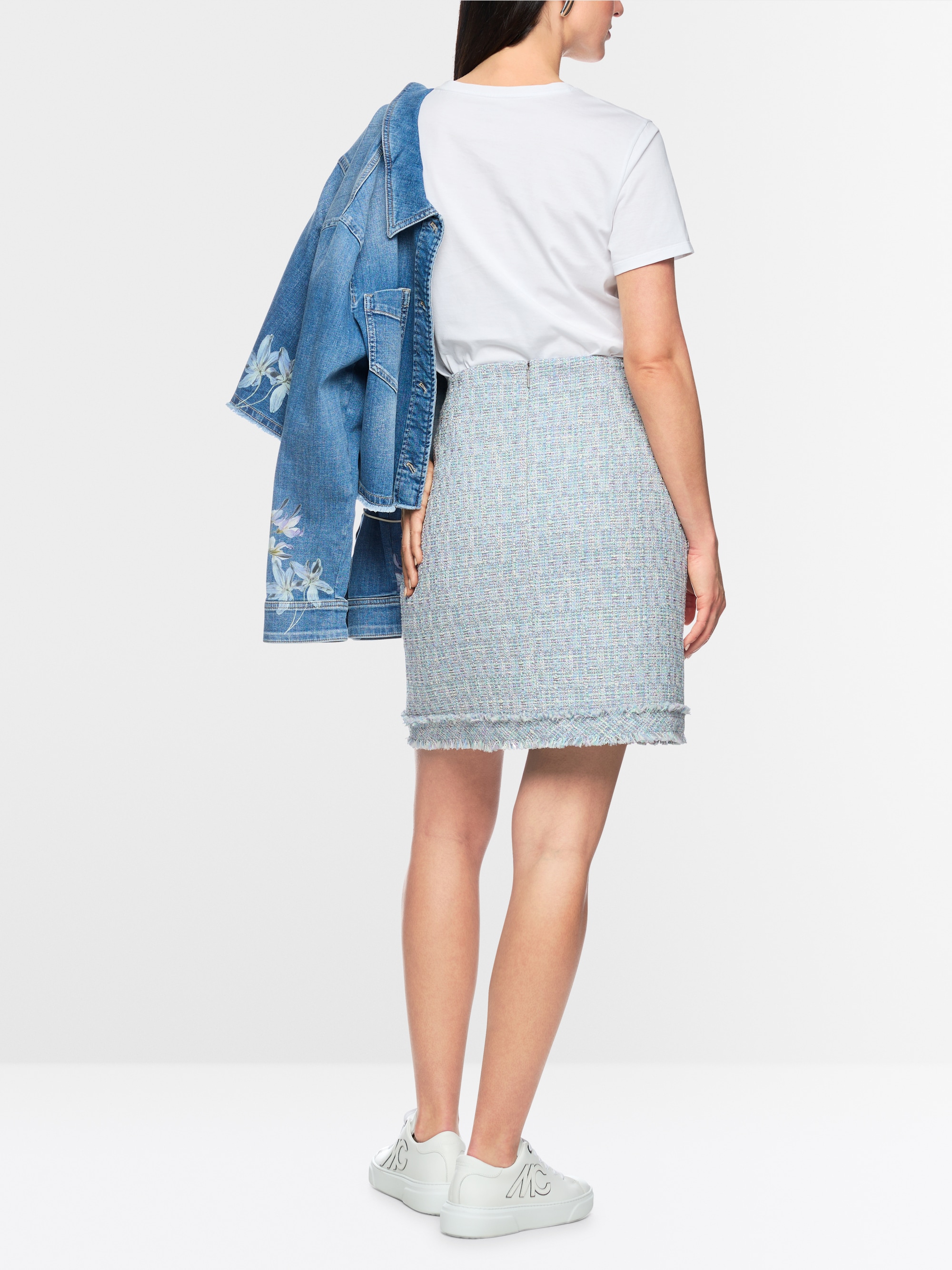 Mini-jupe en bouclé à franges