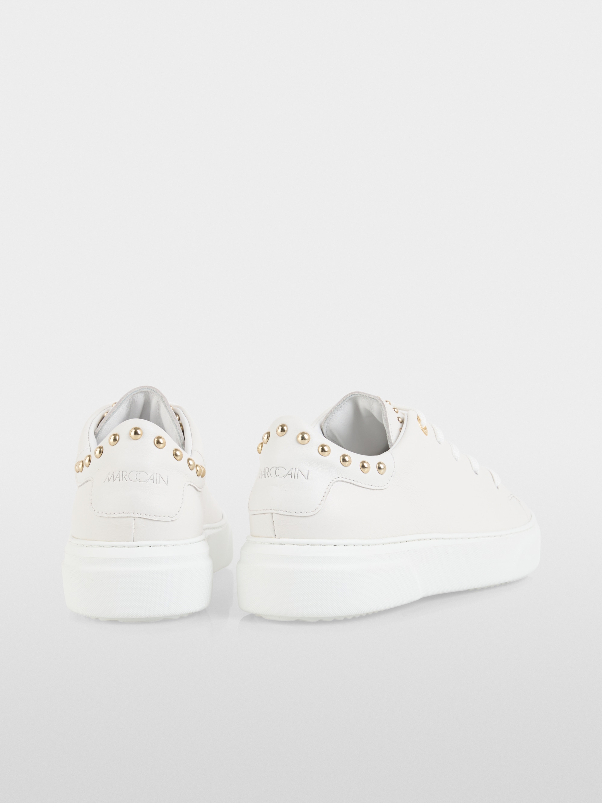 Leather trainers with stud details