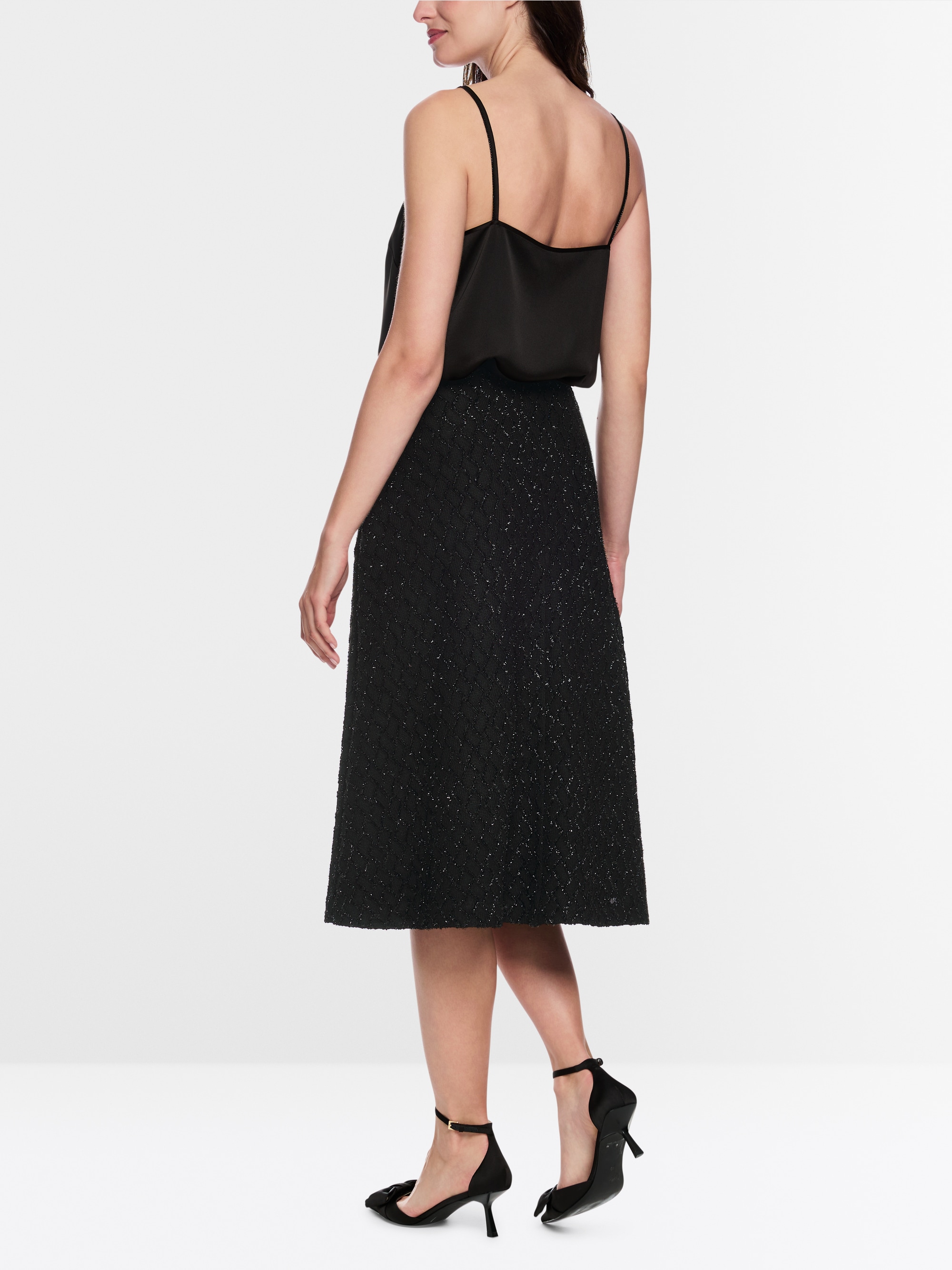 Swinging skirt with glitter details