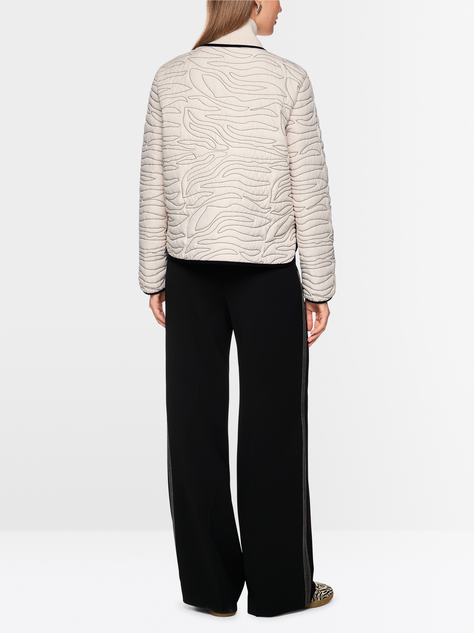 Veste matelassée courte avec détails tricotés