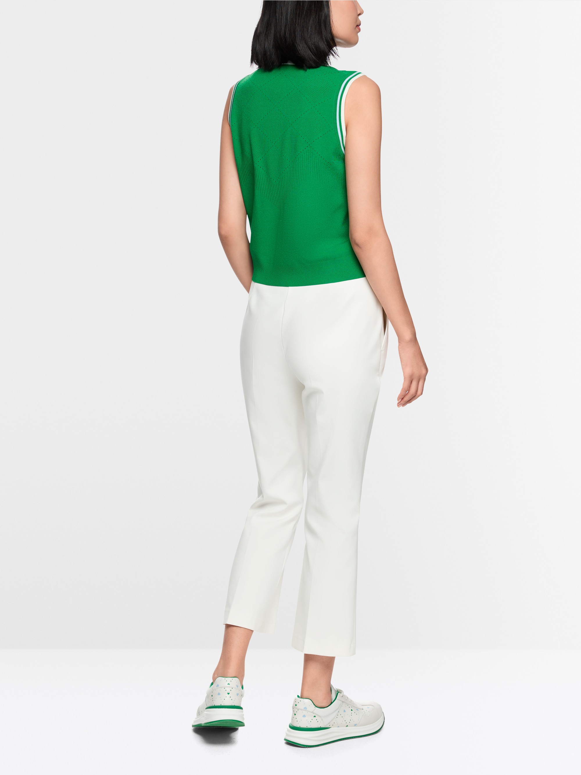 Knitted top with openwork pattern