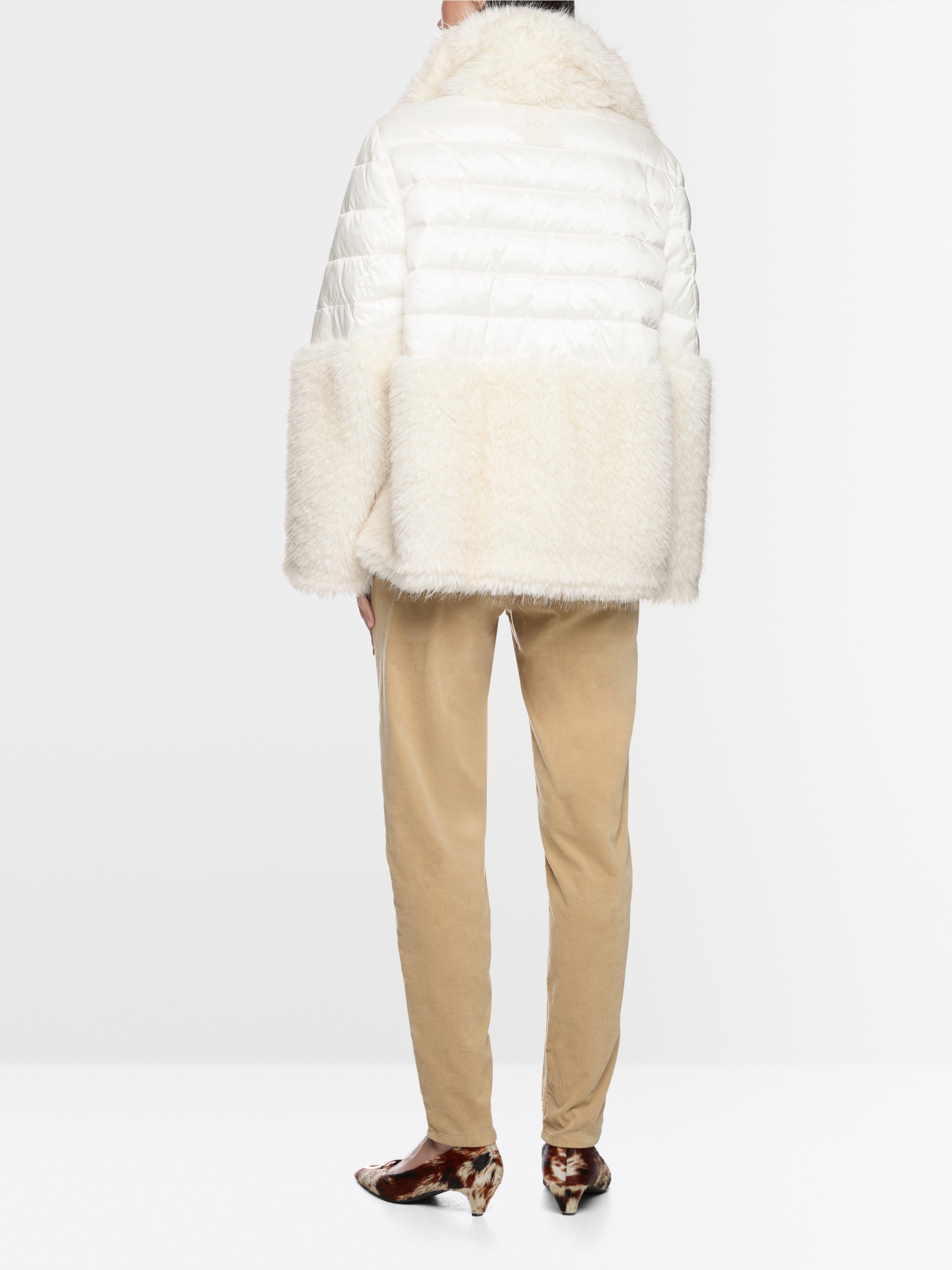 Quilted jacket with faux fur