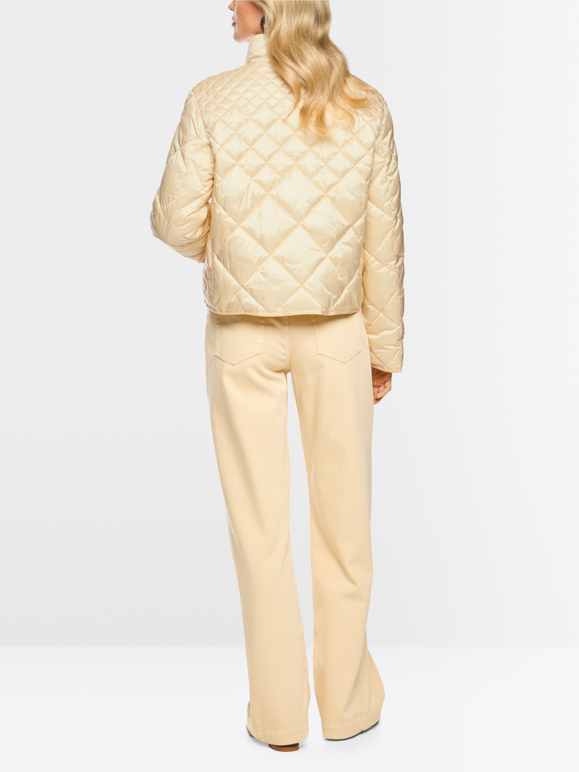 Quilted jacket with decorative buttons