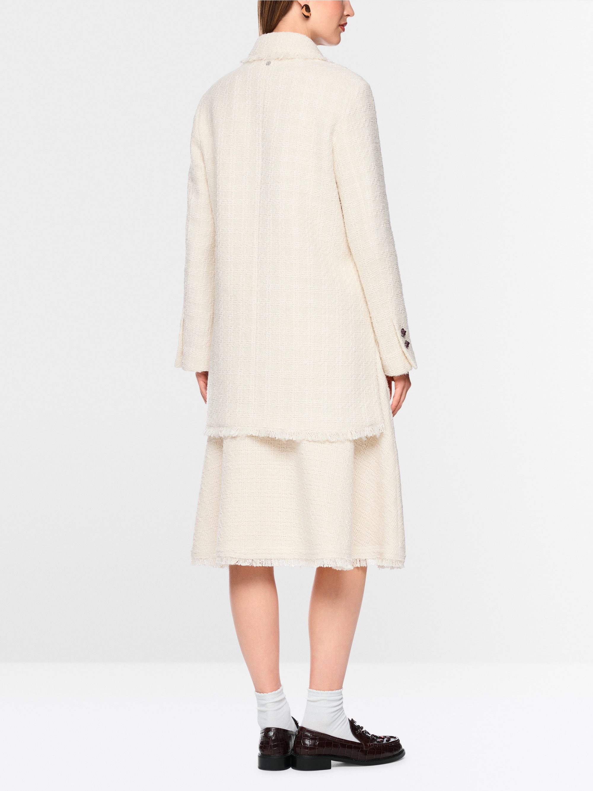 Bouclé jacket with fringing