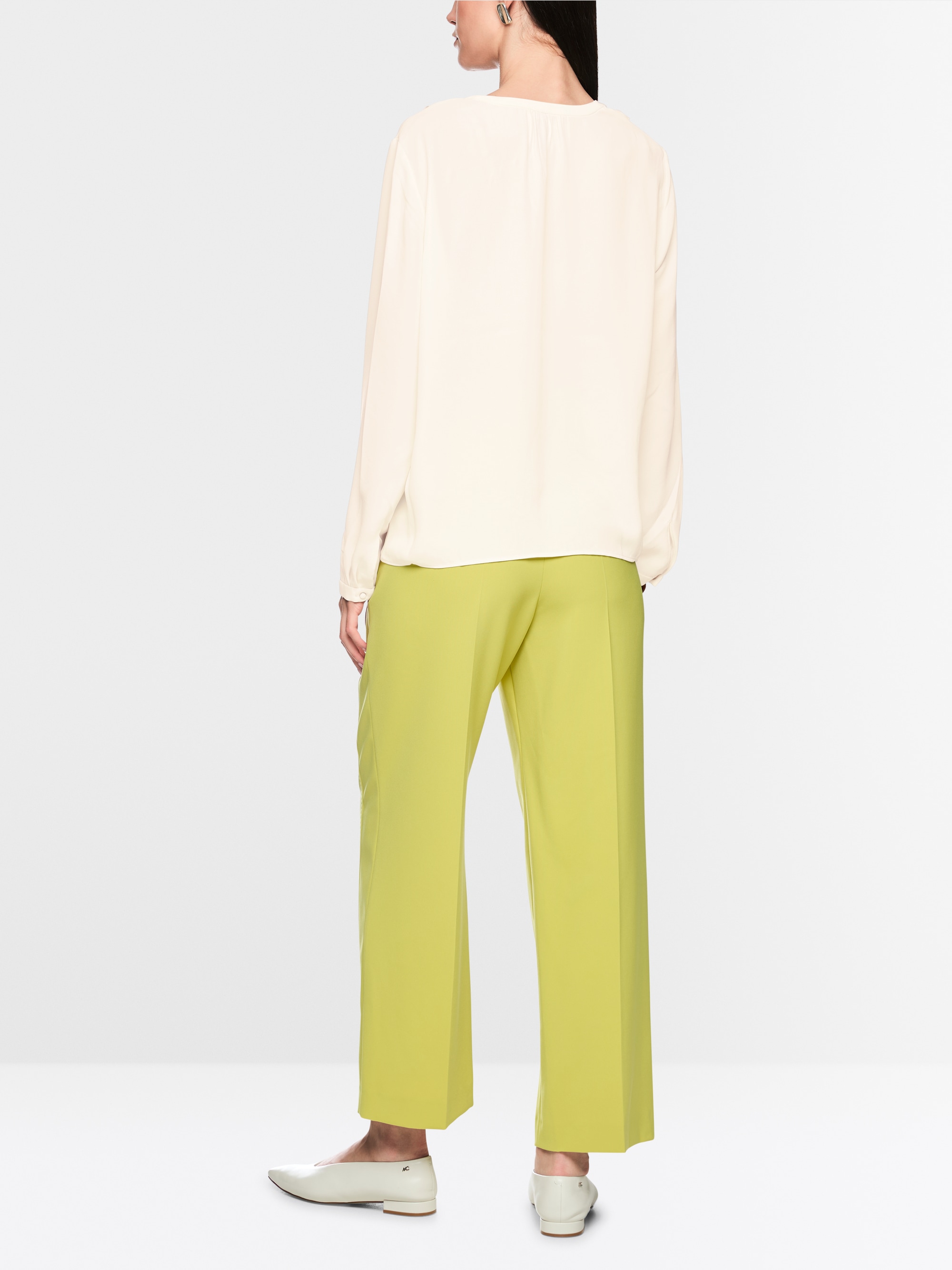 Blouse with flounces