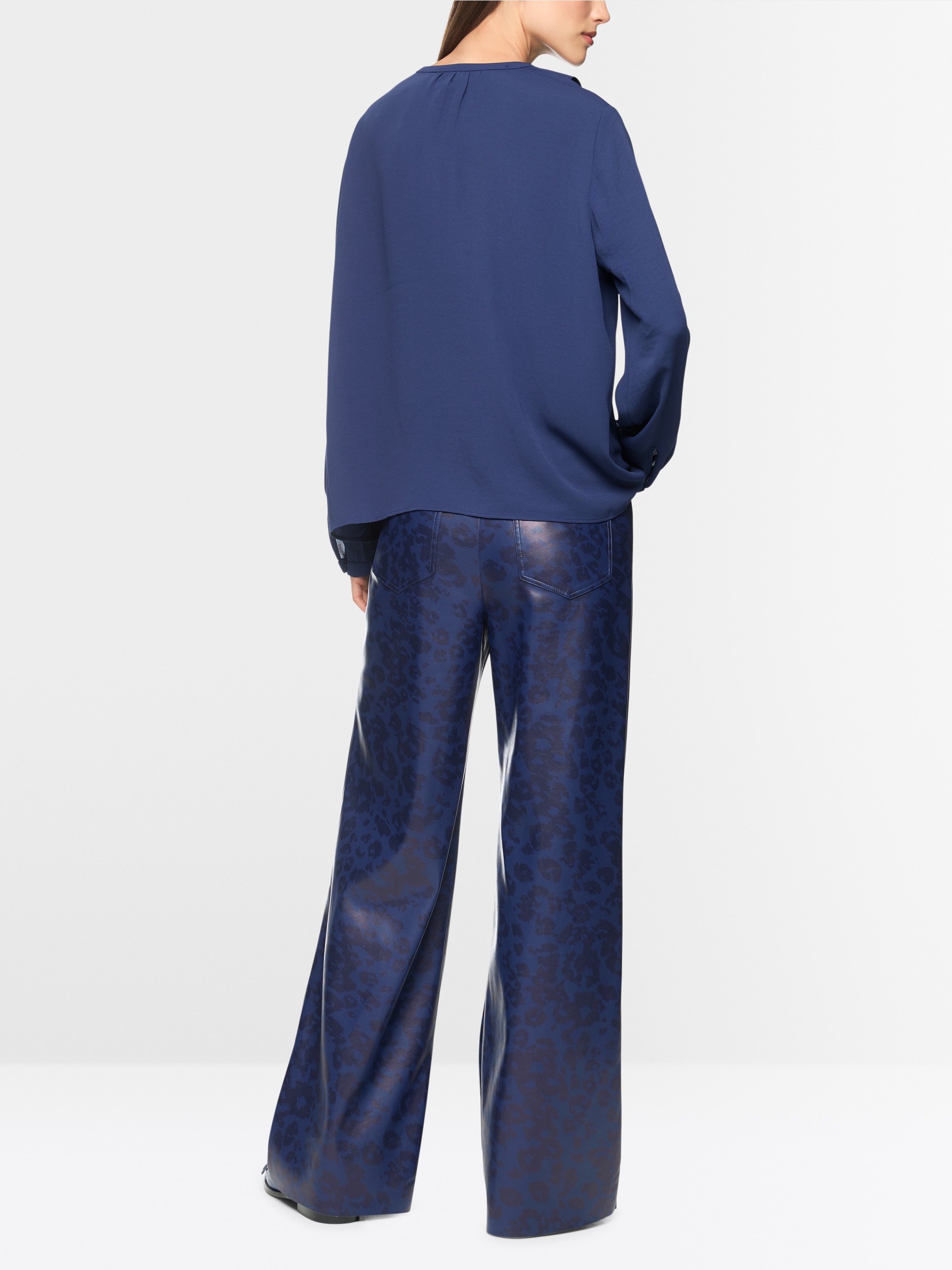 Blouse with flounces