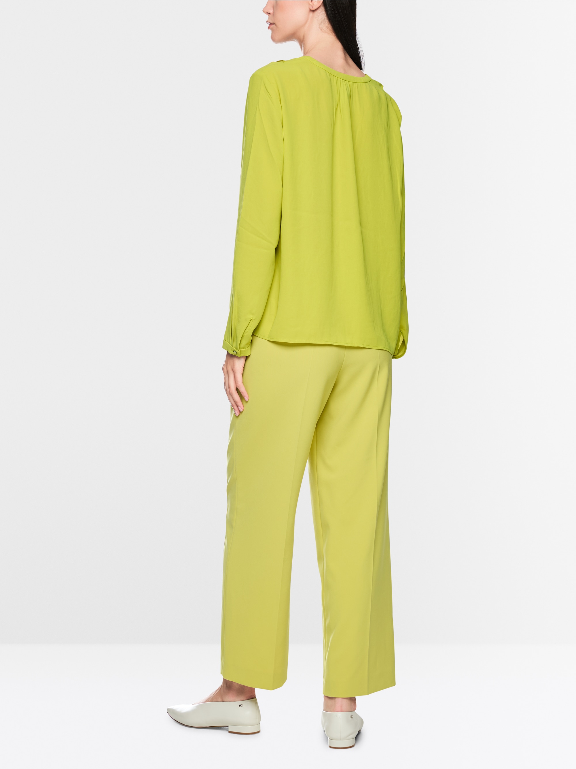 Blouse with flounces