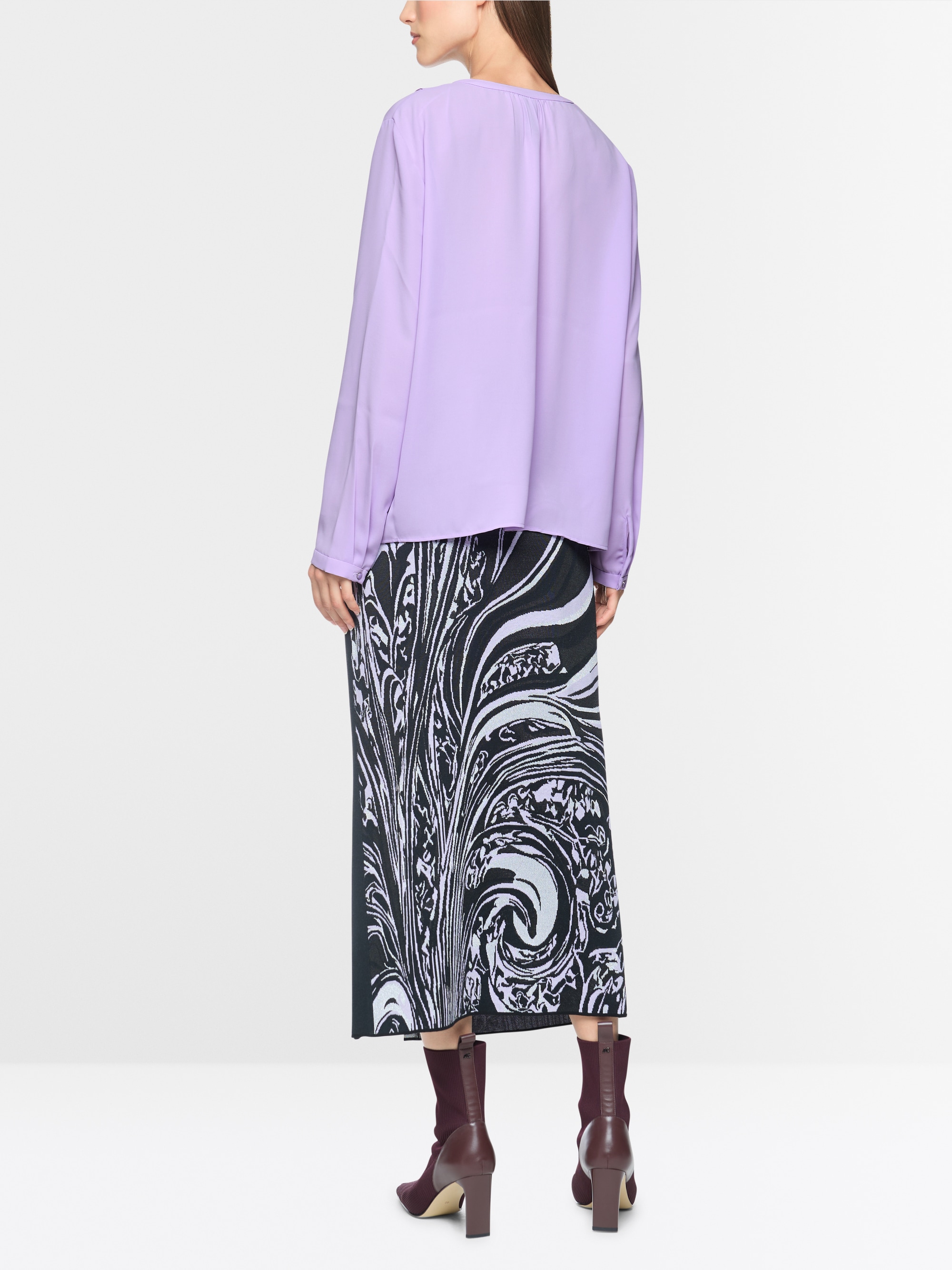 Blouse with flounces