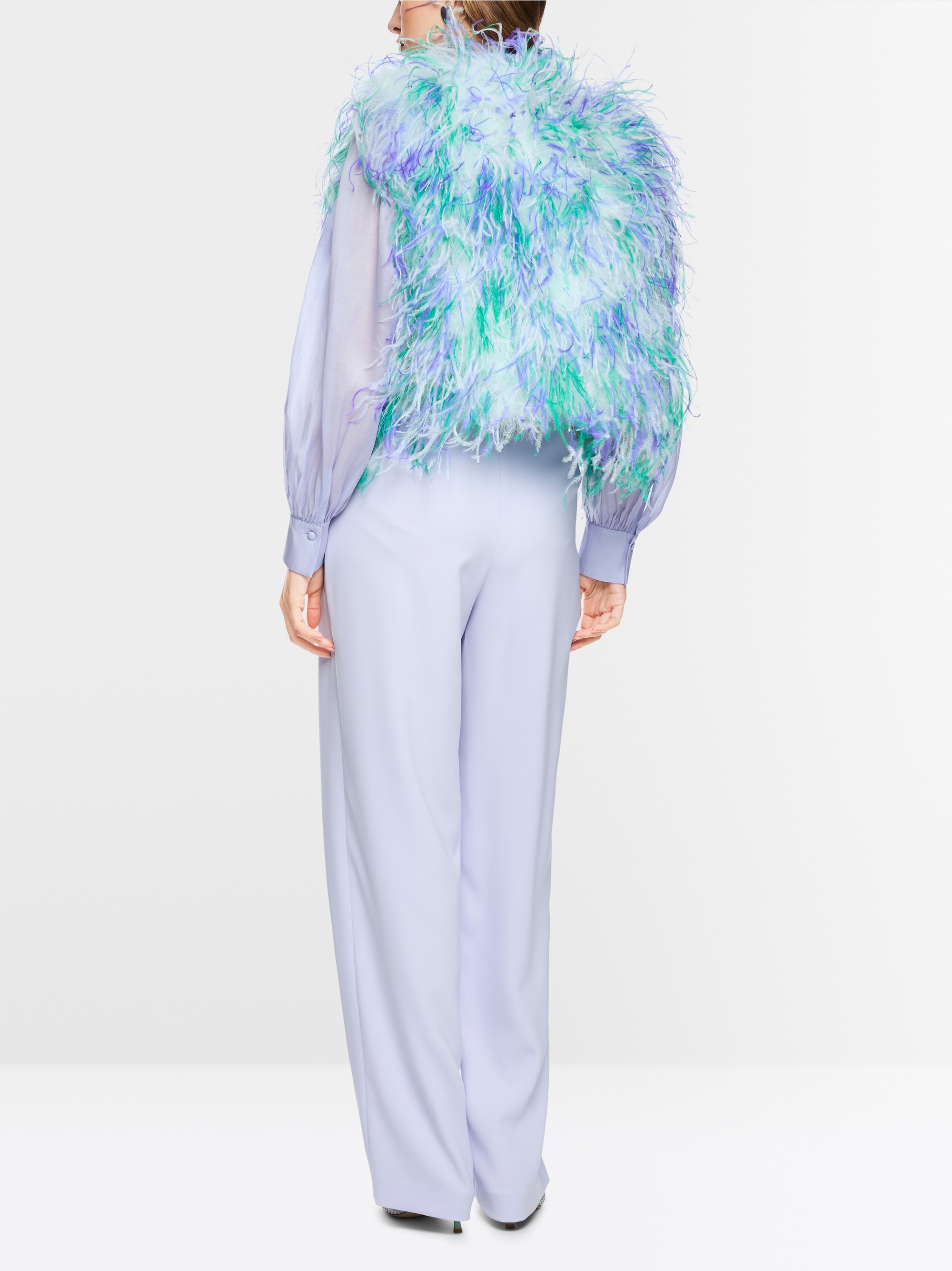 Gilet avec plumes d'autruche