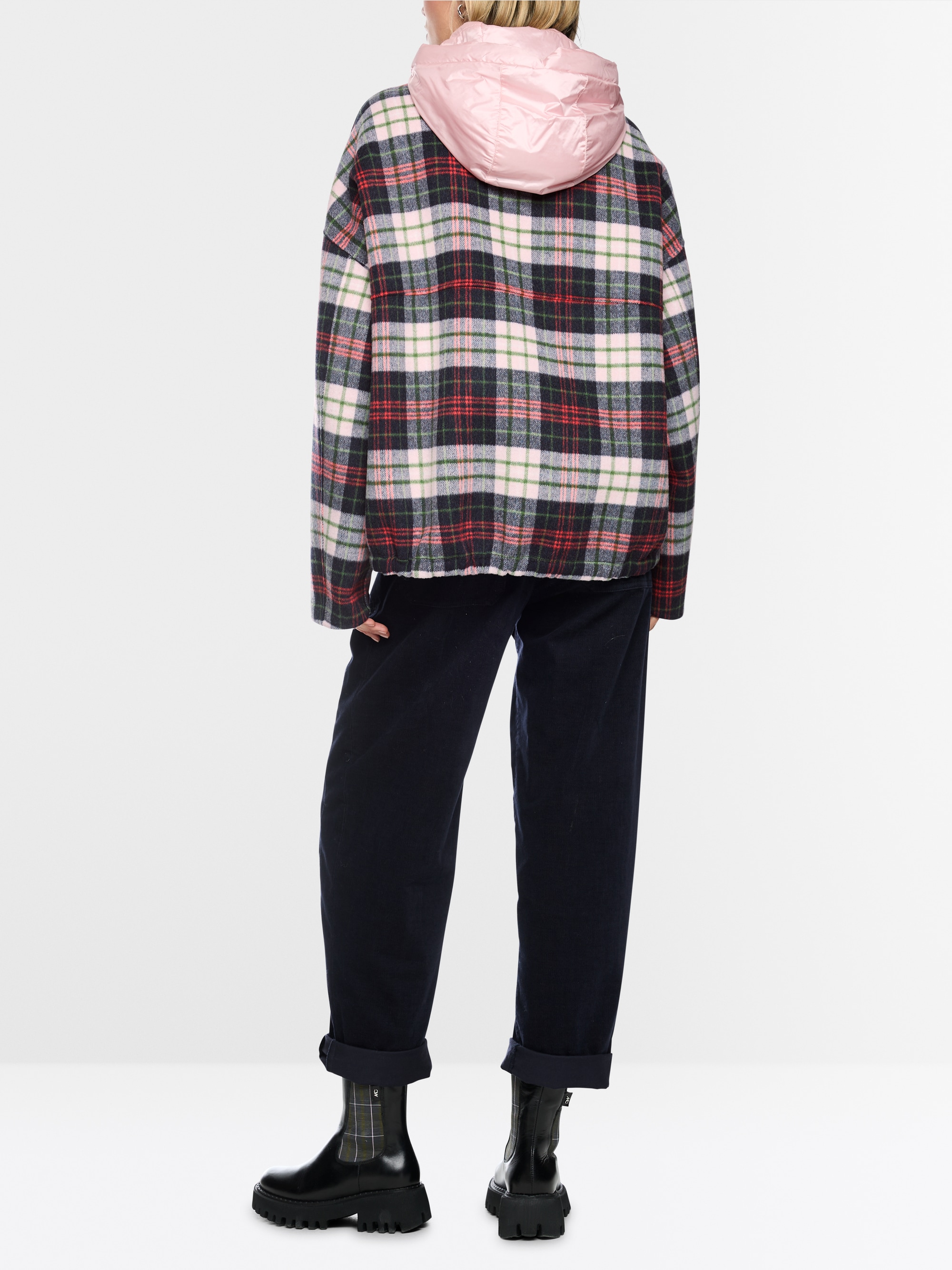 Reversible jacket with quilted hood