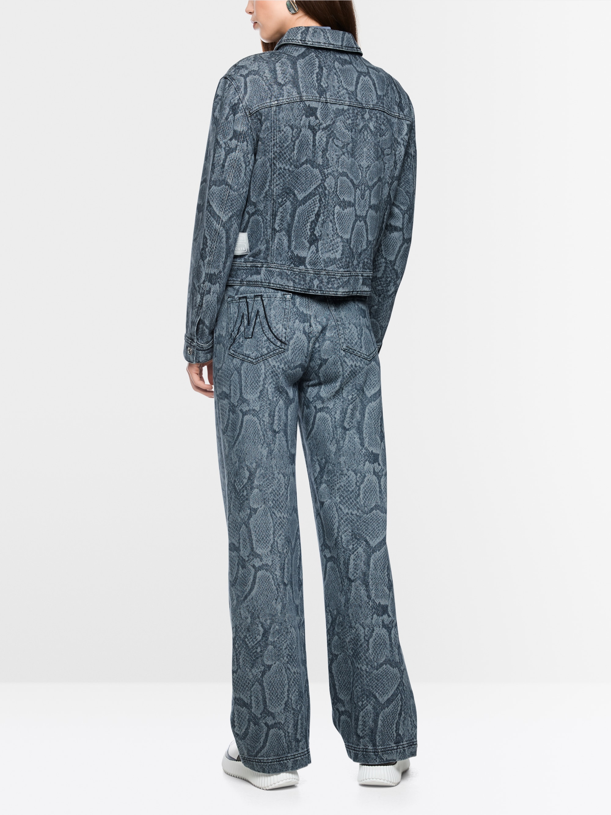 Denim jacket with animal print